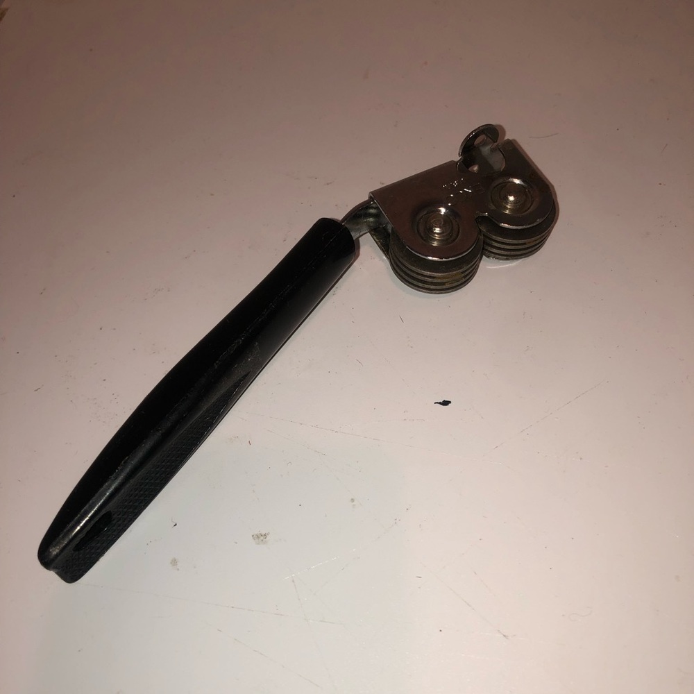 Vintage Echo Black plastic handle , knife sharpener, stainless steel. Used